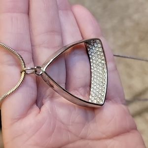 Long silver necklace with triangle bling charm